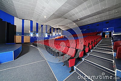 Rows of red, blue seats in Neva cinema Editorial Stock Photo