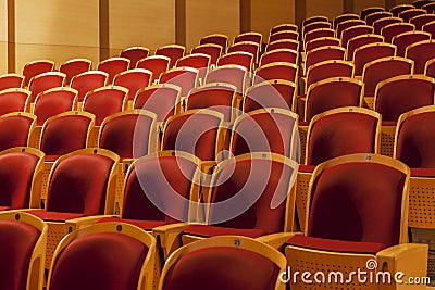 Rows of red theater seats Stock Photo