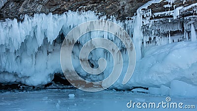 Rows of stalactite icicles, similar to lace frills Stock Photo