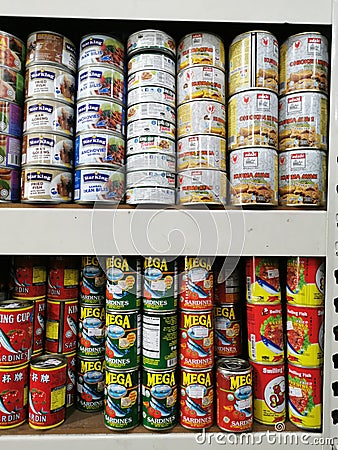 Rows of variety canned food product on shelves Editorial Stock Photo