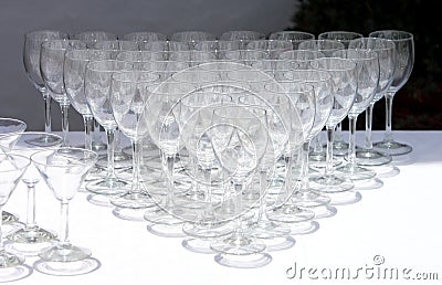 Rows of wine glasses waiting to be used Stock Photo