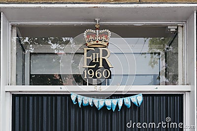 1960 Royal cypher of HM the Queen Elizabeth II EIIR on a building in Lymington, New Forest, UK Editorial Stock Photo