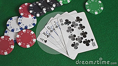 Royal Flush of Clubs and Poker Chips Stock Photo