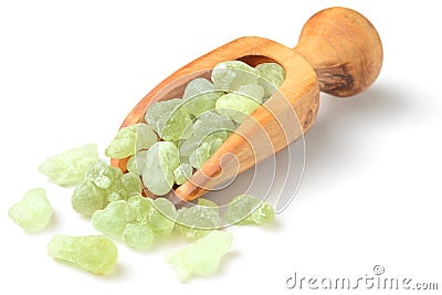 Royal Green Hojari Frankincense in the wooden spoon, isolated on white Stock Photo