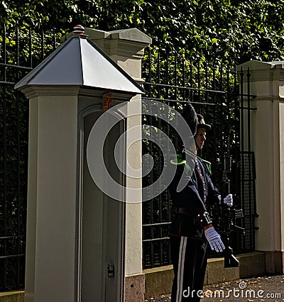 Royal guard standing by his guardhouse Editorial Stock Photo