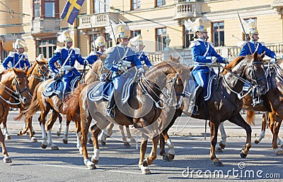 The Royal guards in blue uniforms on the horse back Editorial Stock Photo