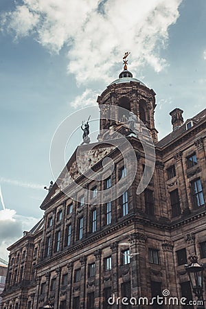 Royal Palace at the Dam Square, Amsterdam. It was built as City Hall during the Dutch Golden Age in the 17th century. Editorial Stock Photo