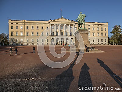 Royal Palace - a sunny day in Oslo, Norway; clear, people and shadows. Editorial Stock Photo