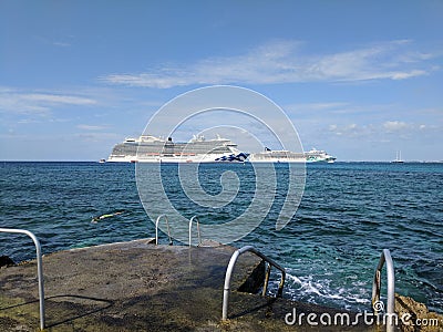 Royal Princess and Norwegian Jade cruise ships at sea Editorial Stock Photo