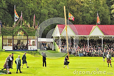 Royal tossing the caber, Braemar Editorial Stock Photo