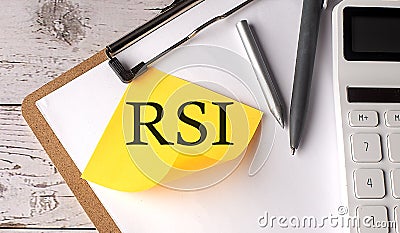 RSI word on a yellow sticky with calculator, pen and clipboard Stock Photo