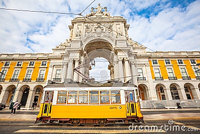 Rua Augusta arch and tram in the historical center of Lisbon in Portugal. Editorial Stock Photo