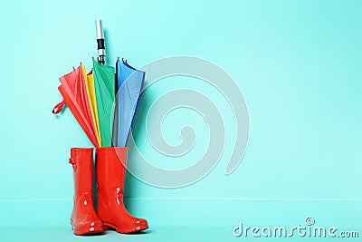 Rubber boots with umbrella Stock Photo