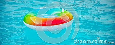 Rubber circle, swimming pool. Help for drowning person. Stock Photo