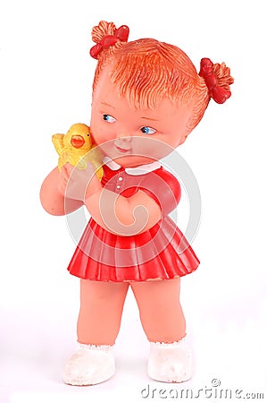 Rubber doll with red dress on Stock Photo