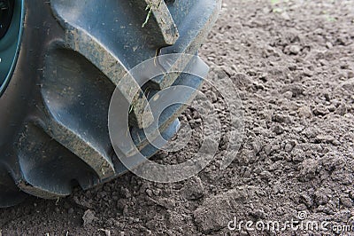 Close up tire wheel of agricultire machine Stock Photo