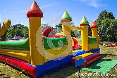 Rubber inflatable castle where children can jump and bounce Stock Photo