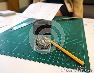 Rubber pad, pencil and clipper on tha table Stock Photo