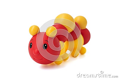 Rubber toy caterpillar on a white background. Child`s toy caterpillar isolated over white background Stock Photo