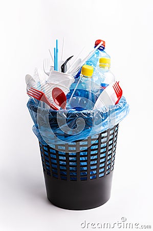 Rubbish bin full of plastic trash or junk isolated on white Stock Photo