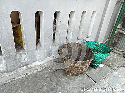 rubbish bin from plastic and bamboo Stock Photo