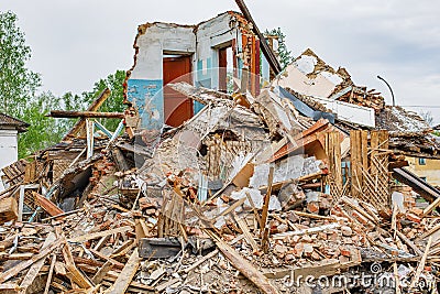 Rubble of old ruined house. Pile of construction fragments Stock Photo