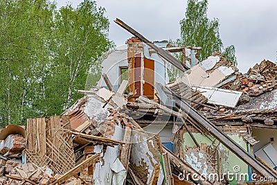 Rubble of old ruined house. Pile of construction fragments Stock Photo