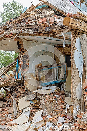 Rubble of old ruined house. Pile of construction fragments Stock Photo