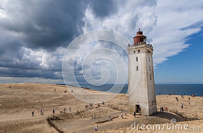 Rubjerg Knude Lighthouse on the coast of the North Sea in the Jutland in northern Denmark. Natural landscape with sand Editorial Stock Photo
