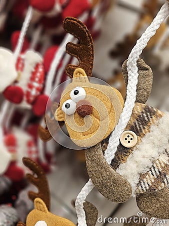 Rudolph the Red-Nosed Reindeer Celebrates Christmas with Santa Claus Stock Photo