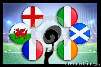 Rugby ball silhouette in hand. Flags of Six Nations, England, Wales, France, Italy, Ireland, Scotland Stock Photo