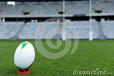 Rugby ball on a stand in stadium Stock Photo