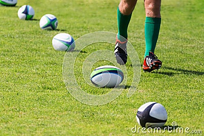 Rugby. Balls lying on pitch during workout Editorial Stock Photo