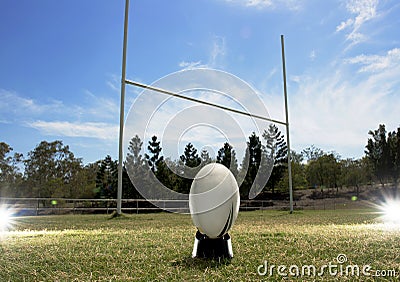 Rugby football positioned in front of the goal posts. Stock Photo