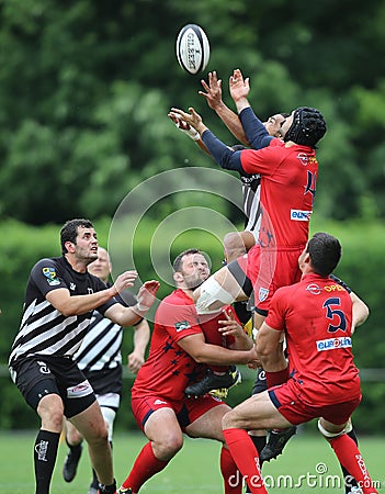 Rugby players fighting for the ball Editorial Stock Photo