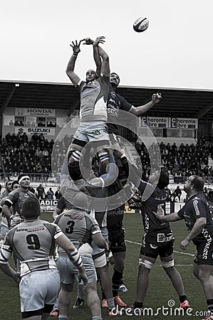 The rugby players from Valence d`Agen and SAXV play each others at Chanzy stadium in Soyaux, France Editorial Stock Photo