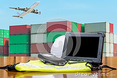 Rugged computers tablet checking containers for logistic concept Stock Photo