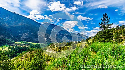 Rugged Mountains along the Fraser River and the Lytton-Lillooet Highway where Highway 12 follows the river for a very scenic drive Stock Photo