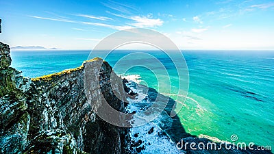 Rugged rocks and steep cliffs of Cape Point in the Cape of Good Hope Nature Reserve Stock Photo