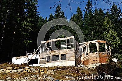 A ruin house close to a forest Stock Photo