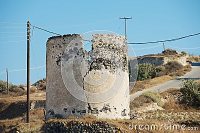 Ruin of an old windmill at Santorini, Greece. Stock Photo