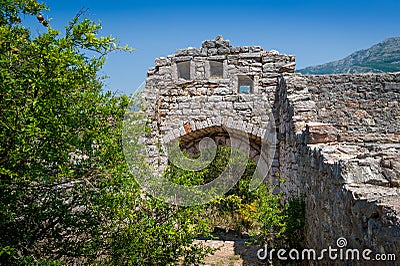 Ruined entrance to medieval fortress of Sutomore Stock Photo