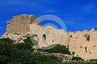 Ruined medieval fortress, view on a sunny day Stock Photo