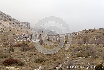 Ruins of ancient amphitheatre in abandoned town Sagalassos lost in Turkey mountains Stock Photo