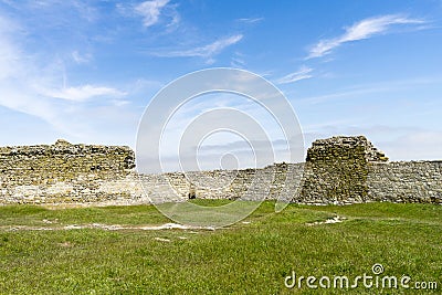 Ruins of ancient Enisala Fortress also referred as Heracleea Fortress on cloudy day in Dobrogea, Romania Stock Photo
