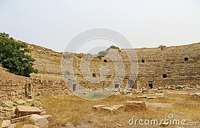 Ruins of ancient Roman arena for gladiators at Leptis Magna on the Mediterranean coast of Libya Stock Photo