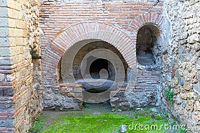ruins of ancient vaulted ovens in pompeii archeological park Stock Photo