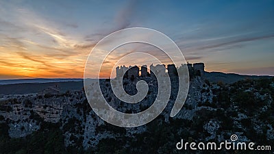 Ruins of the castle of Soyans in Provence in the Drôme during sunset, France. Stock Photo