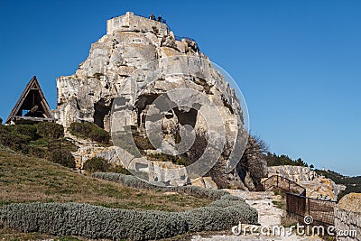 Ruins of the castle standing atop of picturesque village Editorial Stock Photo