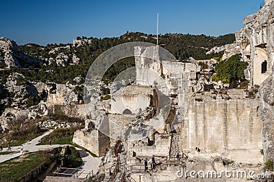 Ruins of the castle standing atop of picturesque village Editorial Stock Photo